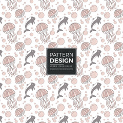 Seamless pattern design with cute dolphins and jellyfish © MdAzizul