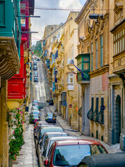 Valletta old town street with traditional balconies