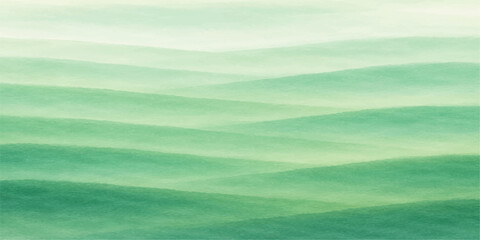 Obraz premium A beautiful summer landscape where a green field meets the horizon under a blue sky filled with white clouds and natural light