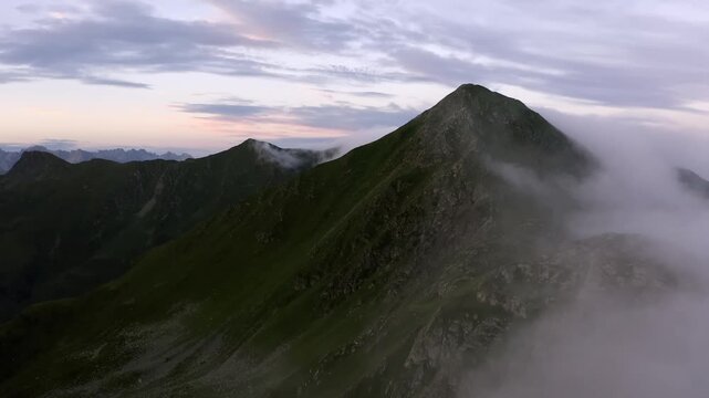 Aerial View of Green Mountin Peak with Rolling Mist t Twilight