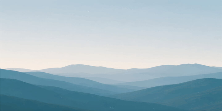 A serene mountain landscape at sunrise features mist and fog rolling through a forested valley under a blue sky filled with clouds as the morning sun casts a glow over the horizon