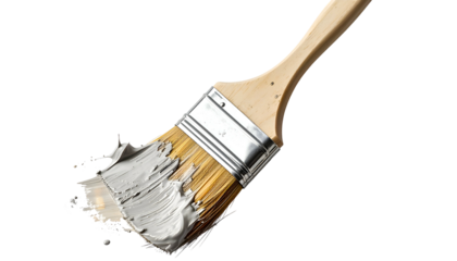 A paint brush laden with wet grey paint, angled, on a stark black background