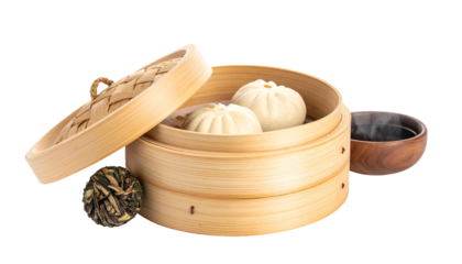 Bamboo steamer with fluffy buns, tea, and a tea ball on a transparent background