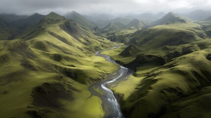 Aerial view of the Skaftafell region in Iceland with rolling green hills and rivers under overcast skies, a rugged and majestic landscape