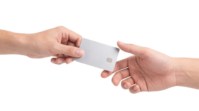 Two hands exchanging blank silver credit card with chip isolated on transparent background
