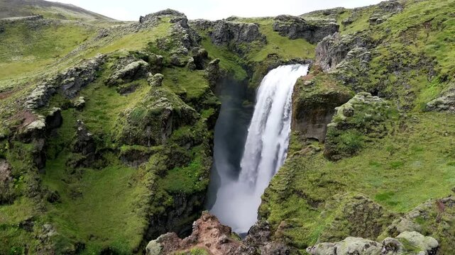 Aerial Close-up of MajesticWaterfall in Icelandic Gren Canyon