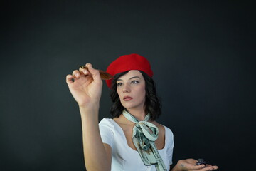 Woman writing with an old pen. Hand holding pen. Copying area.