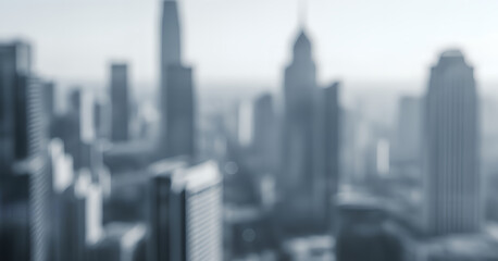 Soft focus modern city view displaying multiple skyscrapers and a straight road between them, suitable as a professional background for corporate communication and advertising layouts.