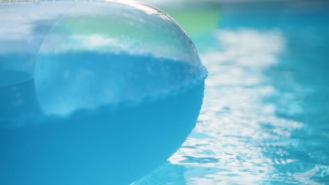 Blue and Green Pool Float on Swimming Pool Water Background