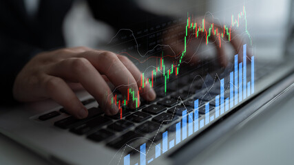 A business professional engages in financial analysis using a laptop, with graphical representations of market trends and data insights, emphasizing investment strategies and analytics. Scalp