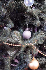 Silver ornaments on Christmas tree