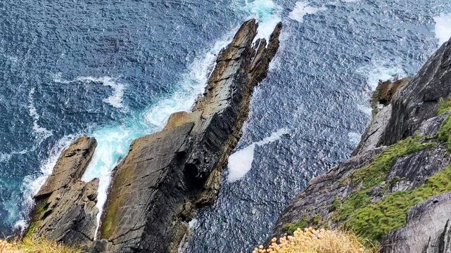 Scenic view on the rocks and Atlantic ocean from Kerry Cliffs, Portmagee, Ring of Kerry, Ireland
