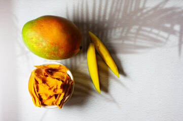 Bowl of assorted nuts and dried fruits, nutritious and convenient snack option.
