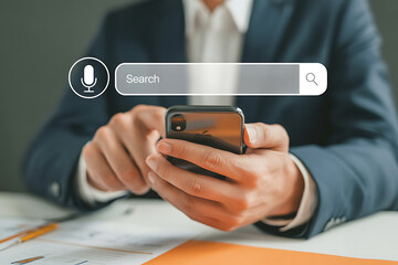 Businessman using voice search on smartphone