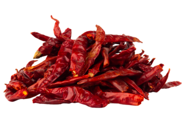 Roasted chilies are piled up on a white background