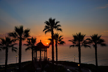 Obraz premium serene sunset at the Parque Chino (Chinese Park) in Miraflores, Lima. The park, inaugurated in 2022 to celebrate the bicentennial of Peru's independence and the long-standing friendship between Peru a