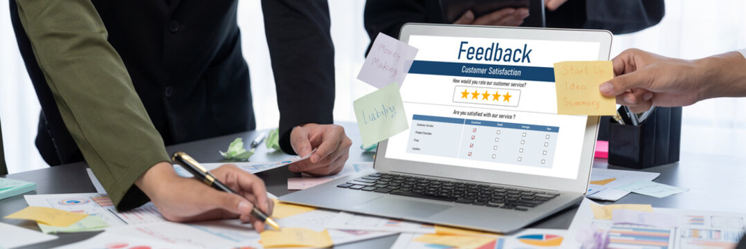 Analyst team use sticky note for creative and analytic brainstorm for business idea with BI data dashboard on laptop screen. Analysis financial data visualization tech for marketing strategy. Prodigy - Powered by Adobe