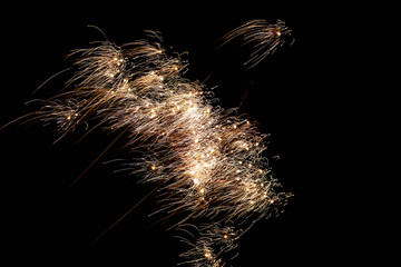 Detailed macro shot capturing shimmering golden confetti at wedding farewell celebration