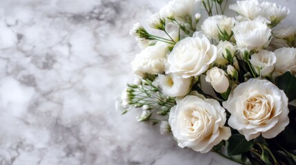 A bouquet of white flowers is neatly arranged on a gray marble surface. The blooms show off their gentle shapes and soft textures. The setting brings out the flowers' natural beauty.