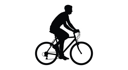 Obraz premium A silhouette of a man riding a bicycle showcasing movement and an active lifestyle