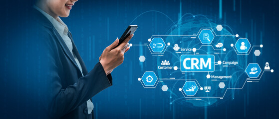 A business professional engages with CRM technology on a smartphone, highlighting the importance of digital tools in customer relationship management and business growth. Tessel