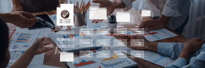 A diverse team collaborates in a modern office, analyzing reports and charts, enhancing strategies, and discussing project management in a dynamic workspace. Trope