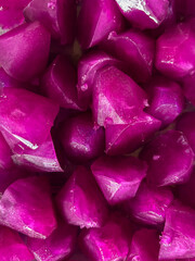 Abstract texture of purple ice cubes with bright highlights