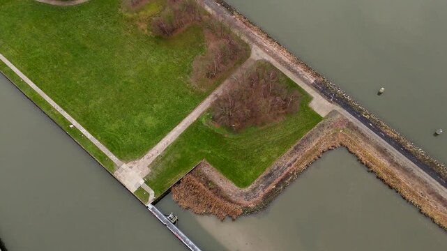 Water Feature Details, Embankment And Pond Landscape View, Serene Aerial Image Of Water And Land Formations