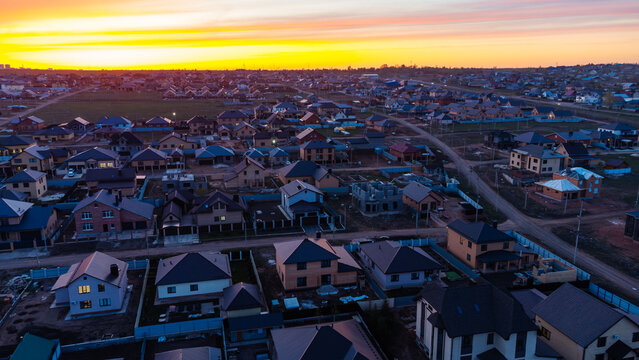Aerial view of the suburbs at sunset