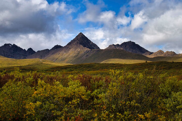 Sun shining on mountains on the Denali Highway