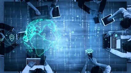 Dynamic business meeting showcasing a diverse team engaging with technology, collaborating on data analysis, and utilizing digital tools over a wooden table. Xenic - Powered by Adobe