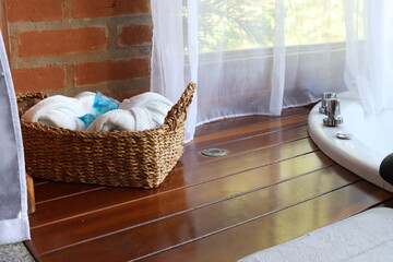 Whirlpool bath in a romantic space surround by a wood deck and nature view