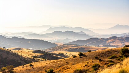 Vast Landscape with Golden Hills and Layered Mountains at Dawn