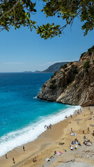 Fototapeta premium Aerial view of Kaputaş Beach, a famous beach with its turquoise water meets a small sandy-pebble beach between Kaş and Kalkan, Antalya, Turkey.