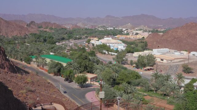 Hatta Dam Lake in mountains enclave region of Dubai, United Arab Emirates aerial footage. High quality 4k footage