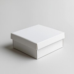 Naklejka premium Clean Studio Photo of a Simple White Cardboard Box Set Against a Soft Grey Background Perfect for Modern Product Presentations and Flat Design Illustration