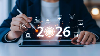 Businessperson interacting with futuristic 2026 digital interface