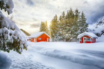 Unbelivable winter scenery with traditional Norwegian red wooden houses on the shore of Rolvsfjord.