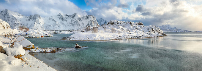 Amazing winter scenery with lots of snow  in small fishing village and snowy  mountain peaks near Valberg.