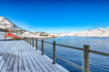 Amazing winter view of  fishing village on Sundstraumen strait that separates Moskenesoya and Flakstadoya islands.