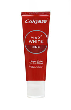 Colgate max white one toothpaste tube isolated on white background