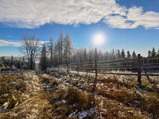 winter mountain landscape with fence