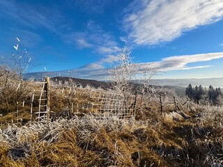winter mountain landscape with fence