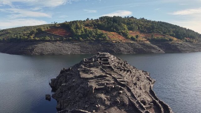 Castro candaz ancient fort ruins emerge from the drought-affected belesar reservoir