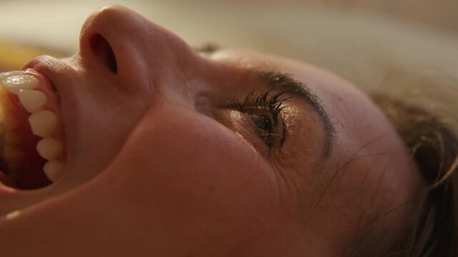 Retro Dreamcore woman Listening to music laying down and signing out loud to herself - close up on mouth and eyes