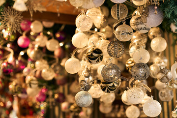 Elegant patterned white, silver, and black Christmas baubles han