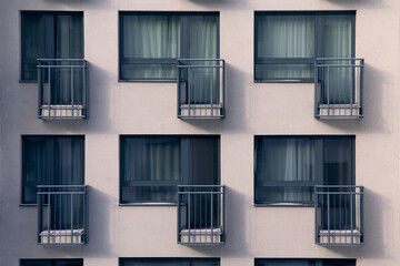 Abstract close-up of a modern residential building facade showin