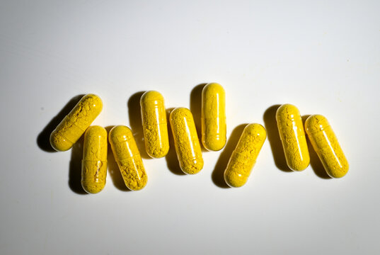 Close up of Berberine Supplement Capsule on White Background