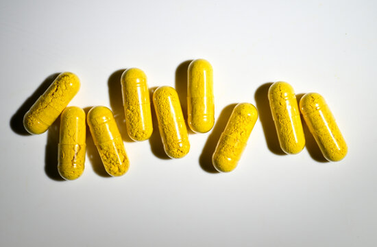Close up of Berberine Supplement Capsule on White Background