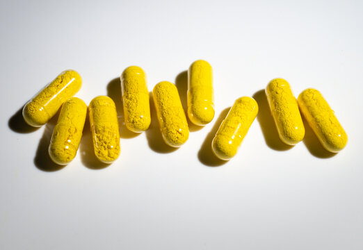 Close up of Berberine Supplement Capsule on White Background